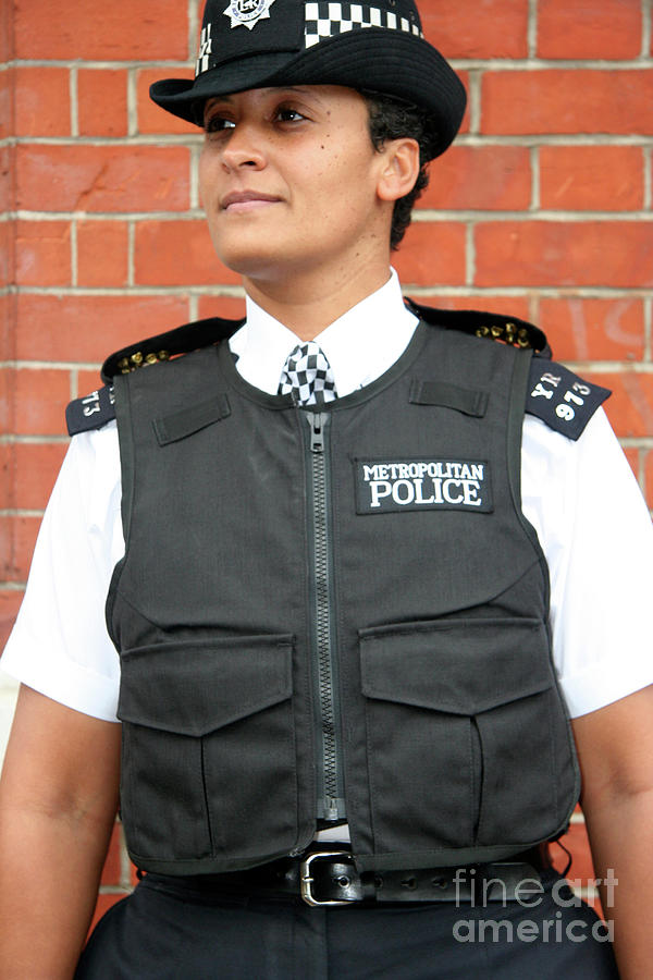 Policewoman Wearing Body Armour Photograph by Cordelia Molloy/science Photo Library