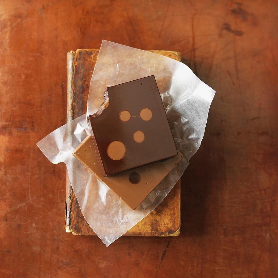 Polka Dot Chocolate With A Bite Taken Out Photograph by Vincent Noguchi Photography