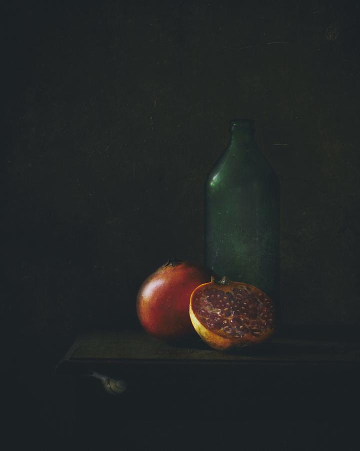 Pomegranate And Green Bottle Photograph by Delphine Devos