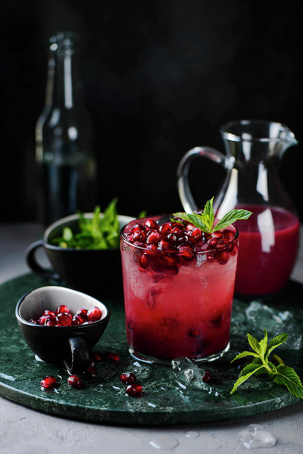Pomegranate Lemonade With Ice And Mint Photograph by Ewgenija Schall