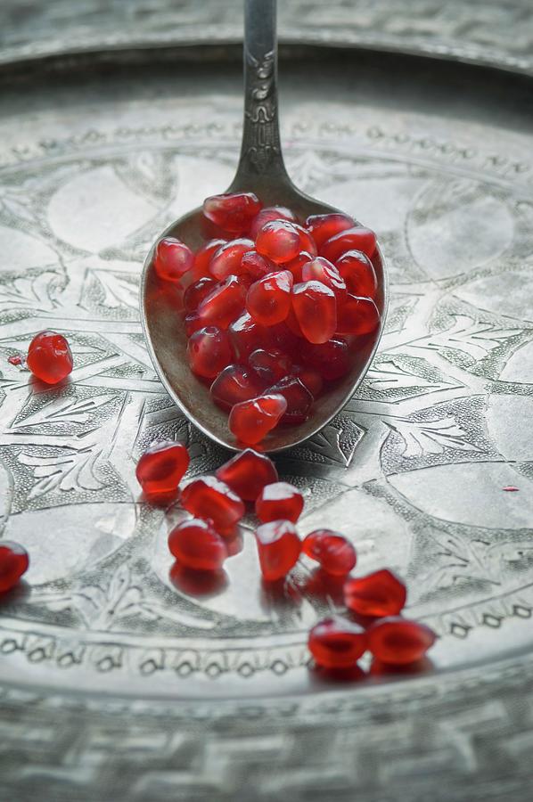 Pomegranate Seeds Photograph by Achim Sass