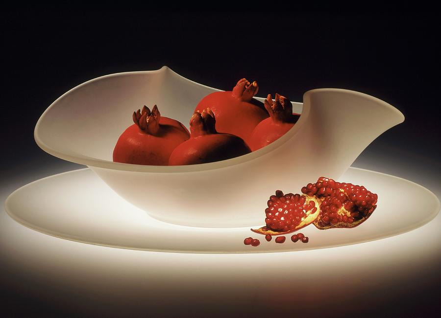 Pomegranates In A White Glass Bowl Photograph by Pat Lacroix