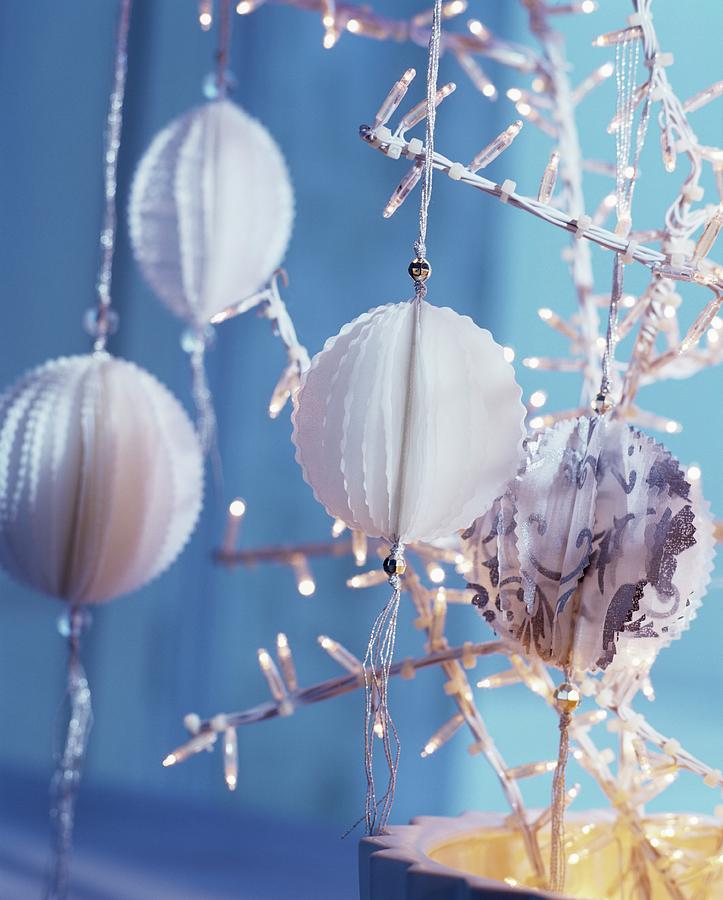 Pompoms Hanging From Small Christmas Tree Made Of Tiny Lights Photograph by Matteo Manduzio