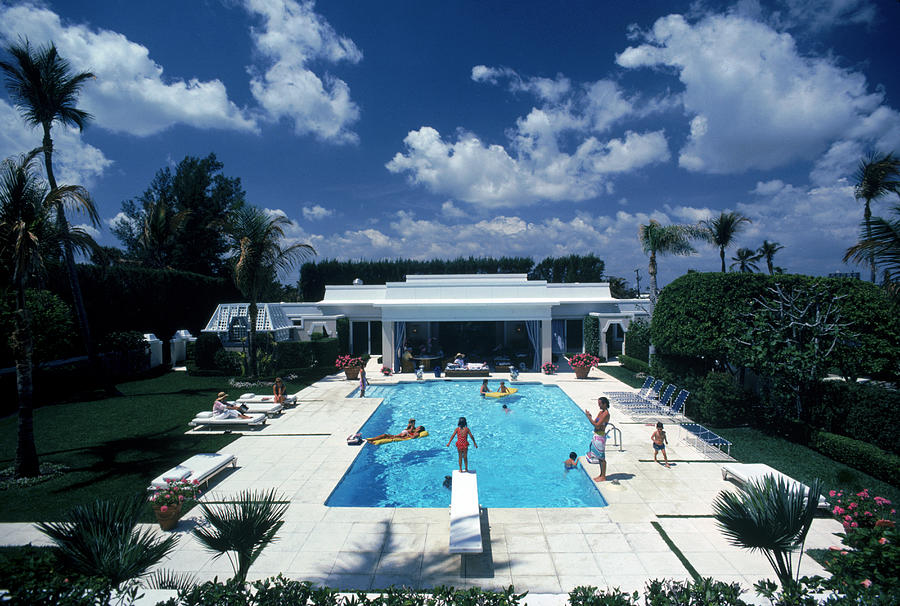 Pool In Palm Beach Photograph by Slim Aarons