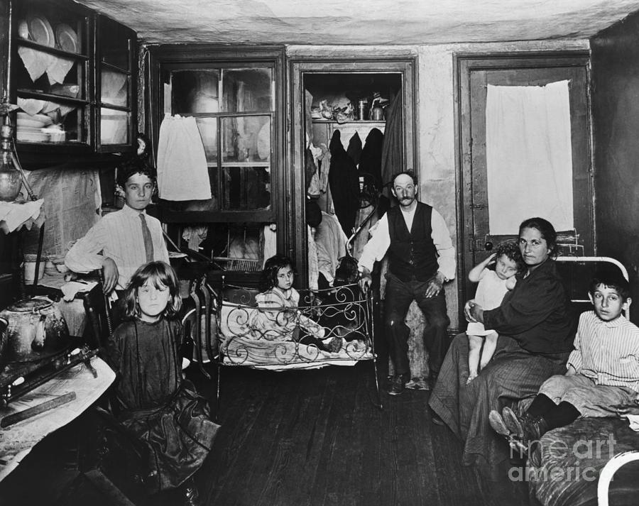 Poor Family In Room Of Tenement Photograph by Bettmann