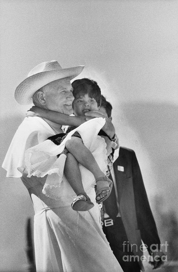 Pope John Paul II Holding Child Photograph by Bettmann