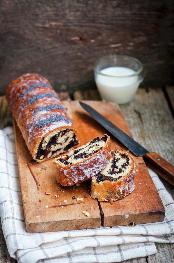 Poppy Seed Roulade, Sliced, ??on A Wooden Board Photograph by Irina Meliukh
