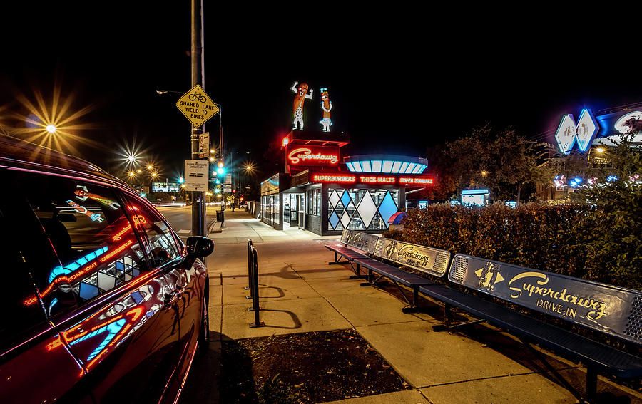 Popular Chicago hot dog drive in, Super Dawg at night Photograph by Sven Brogren