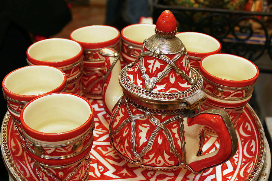 Porcelain and metal tea sets Photograph by Steve Estvanik
