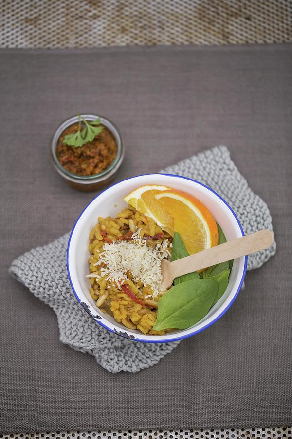 Porcini Mushroom Risotto With Tomato Pesto, Orange Wedges And Baby Spinach Photograph by Tina Engel