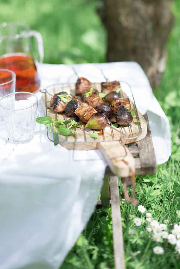 Pork And Fig Brochettes Outdoors Photograph by Carnet
