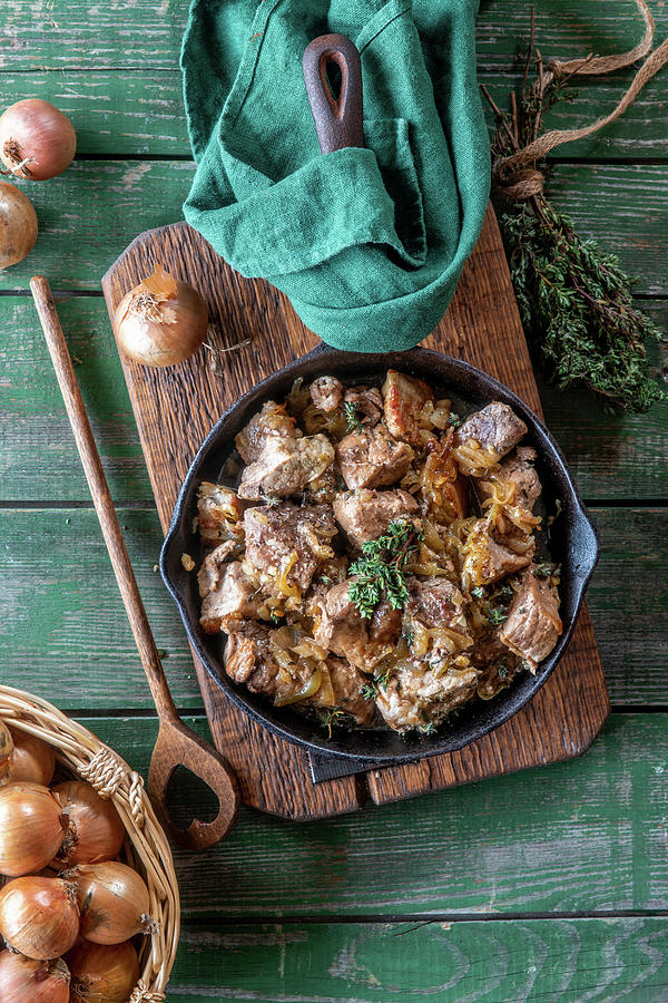 Pork And Onion Stew With Thyme Photograph by Irina Meliukh