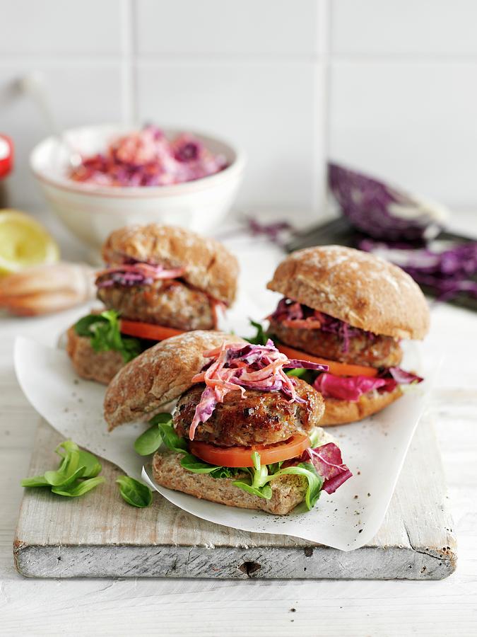 Pork Burgers With Sage And A Red Cabbage Salad Photograph by Gareth Morgans