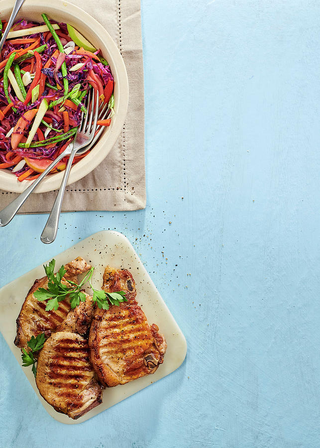 Pork Chops With Cabbage And Apple Stir Fry Photograph by Great Stock!