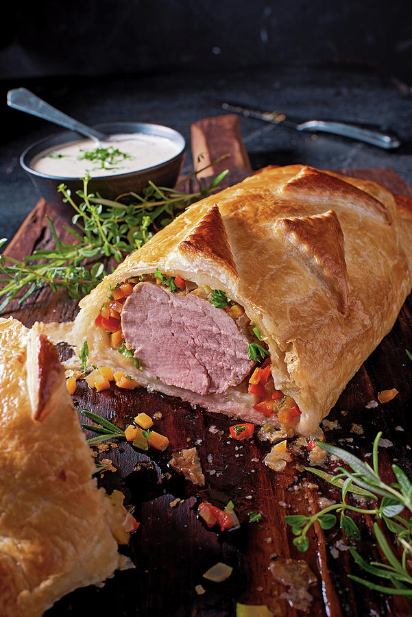 Pork Fillet In Puff Pastry With Onion Sauce Photograph by Torri Tre