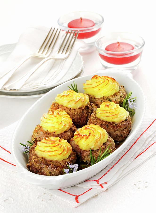 Pork Medallions With A Duchesse Potato Topping Photograph by Franco Pizzochero