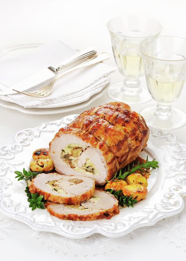 Pork Roulade With A Chestnut Filling Photograph by Franco Pizzochero
