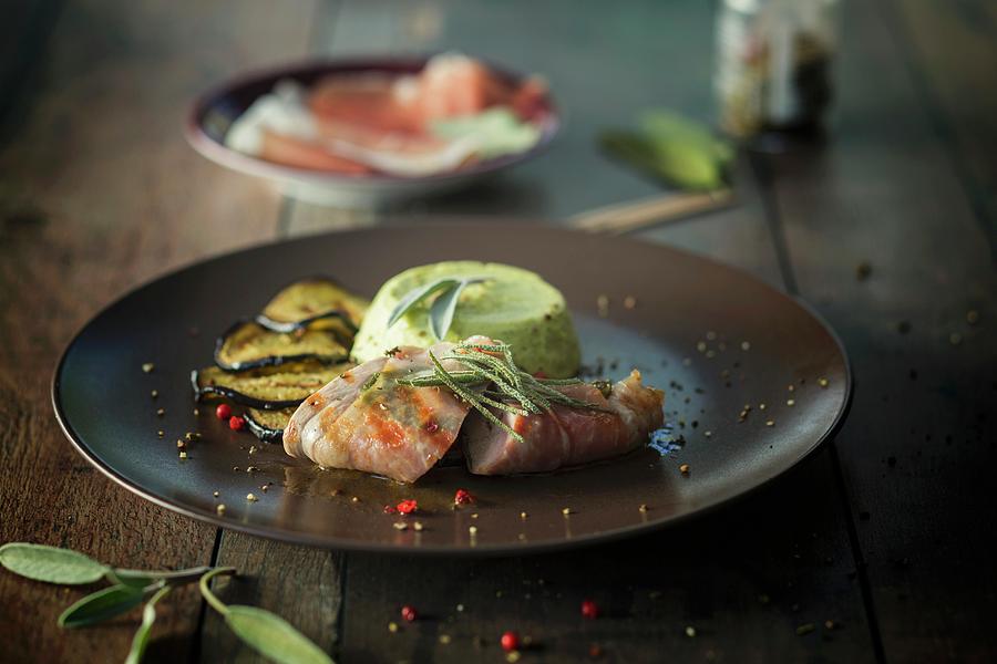 Pork Saltimbocca With A Courgette Flan Photograph by Jan Wischnewski