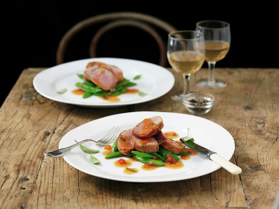 Pork Saltimbocca With Mange Tout And Sage Photograph by Frank Adam