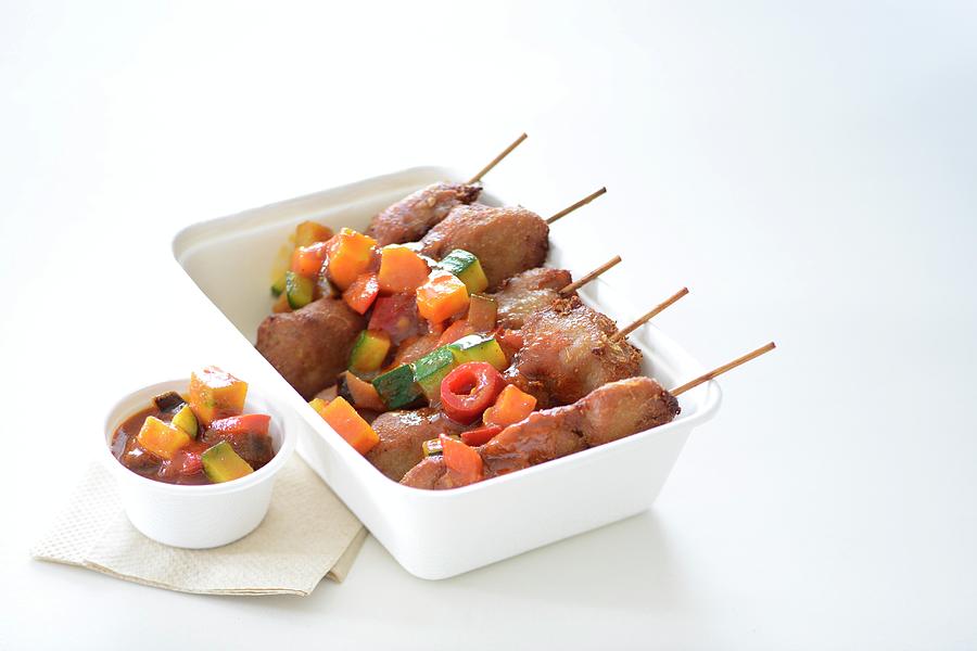 Pork Skewers With Vegetable Sauce In A Takeaway Box Photograph by Tanja Major