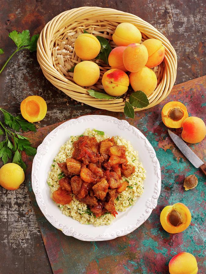Pork With Apricots And Couscous north Africa Photograph by Ian Garlick