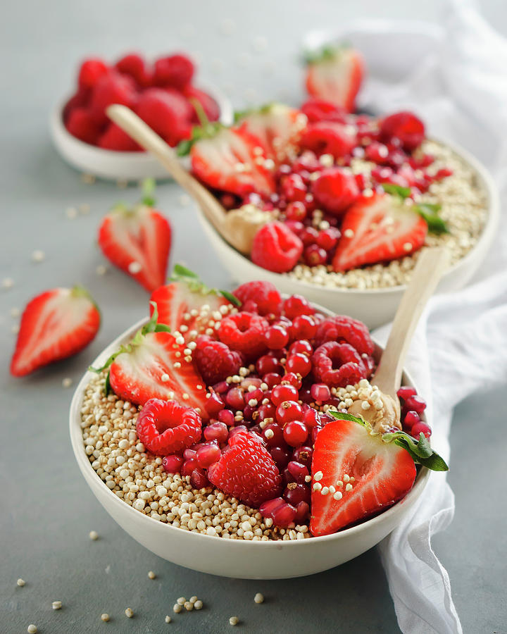 Porridge Bowls With Berries, Pomegranate Seeds And Puffed Quinoa ...