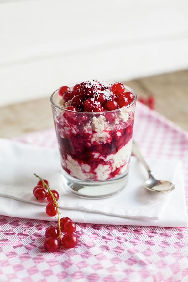 Porridge With Raspberries And Redcurrants Photograph by Claudia Timmann