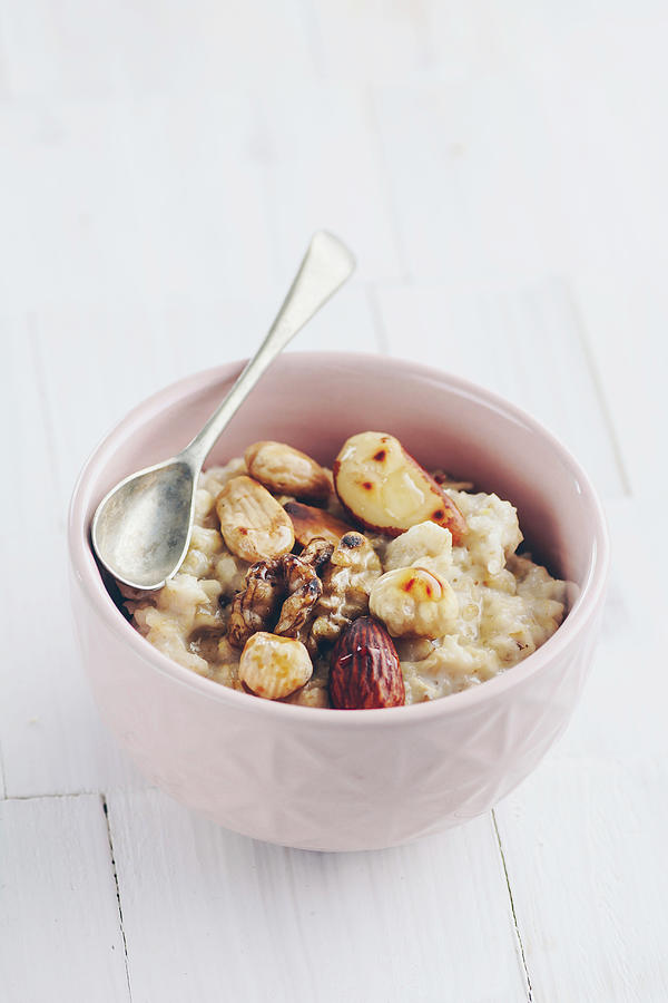 Porridge With Roasted Hazelunts, Almonds, Walnuts And Brazil Nuts Photograph by Mateusz Siuta