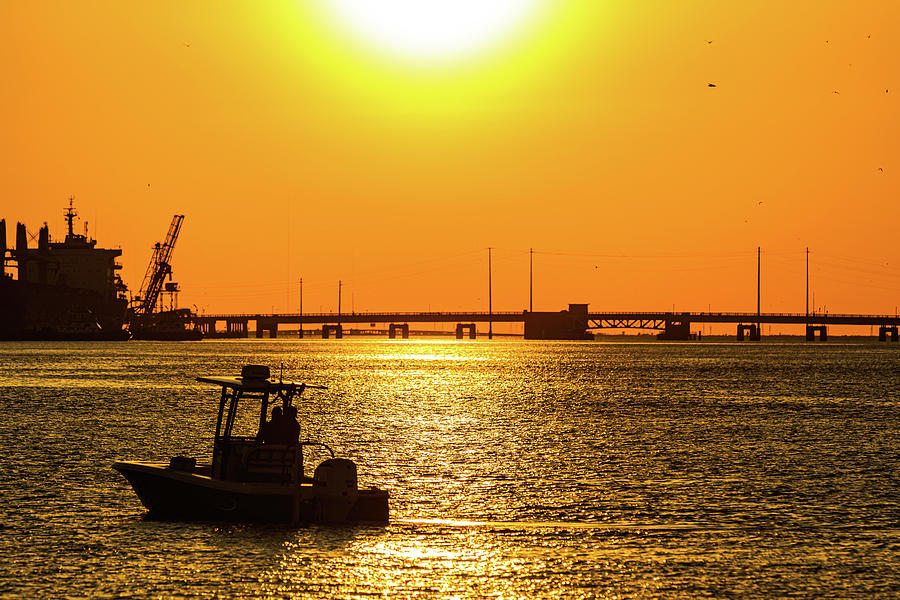 Port of Galveston sunset Photograph by David Ilzhoefer