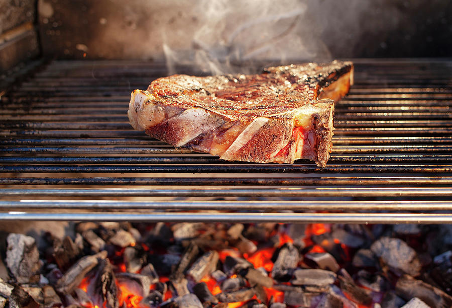 Porterhouse Steak On A Grill Photograph by Manfred Jahrei