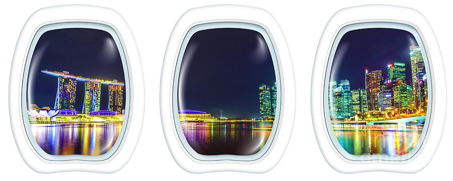 Porthole windows on Singapore by night Photograph by Benny Marty