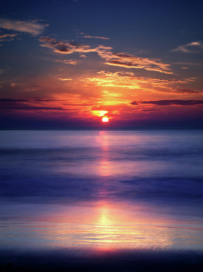 Porthsele Beach At Sunset Photograph by Michael Roberts - Fine Art America