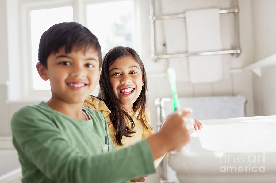 Portrait Brother And Sister Brushing Teeth In Bathroom Photograph By 