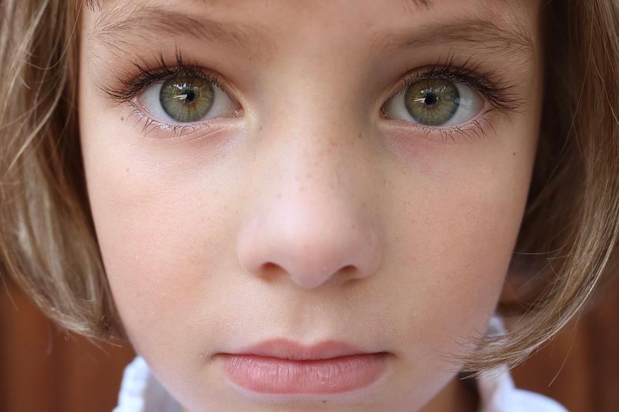 Portrait Of A Brown Haired Girl With Big Green Eyes Photograph By