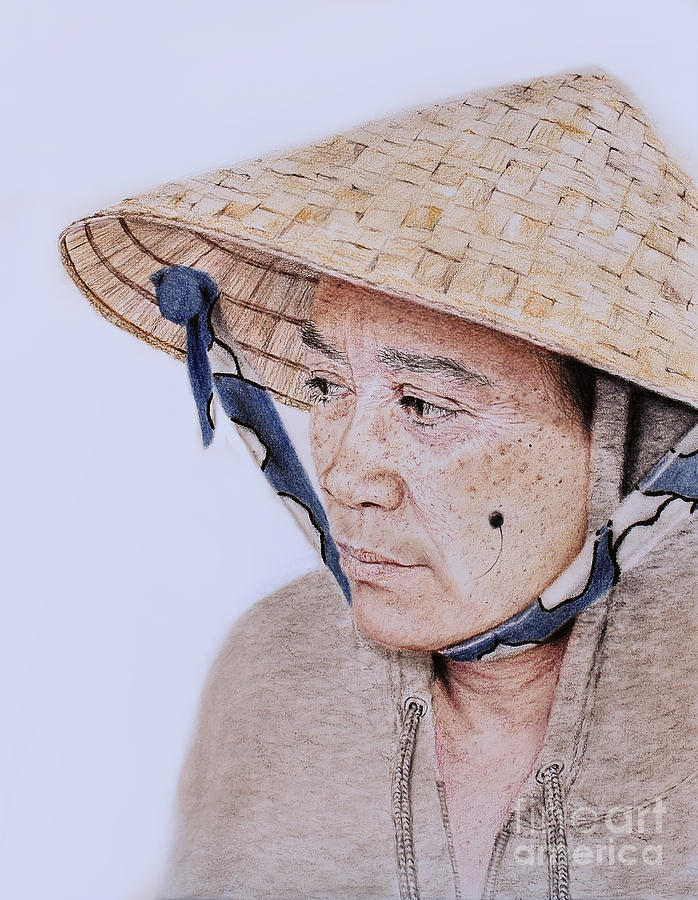 Portrait Of An Attractive Filipina Woman With A Mole On Her Cheek And Wearing A Salakot Hat