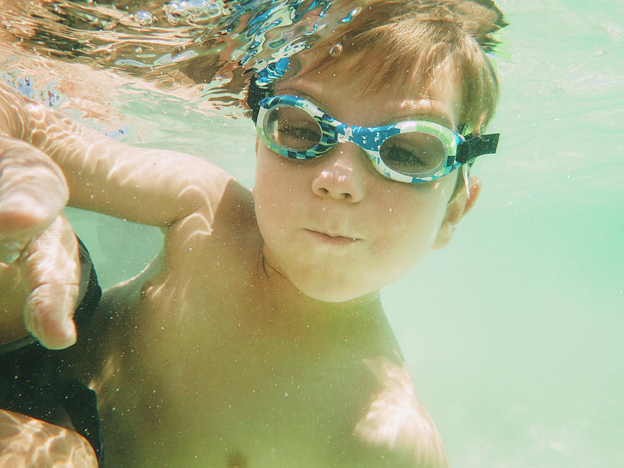 Portrait Of Boy Swimming Underwater Photograph By Cavan Images - Fine 