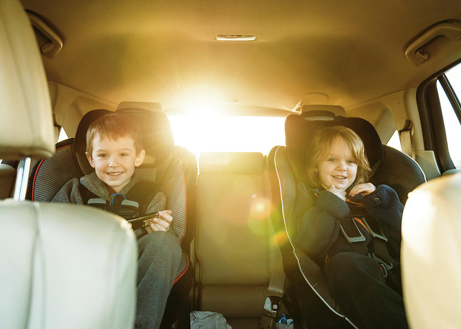 Portrait Of Boys Sitting In Car Photograph by Cavan Images - Fine Art ...