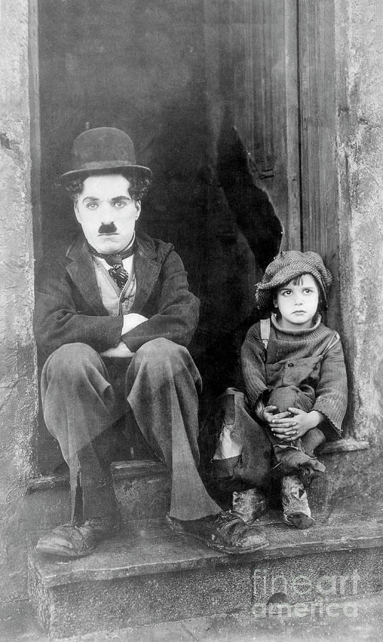 Charlie Chaplin Photograph - Portrait Of Charlie Chaplin And Jackie by Bettmann