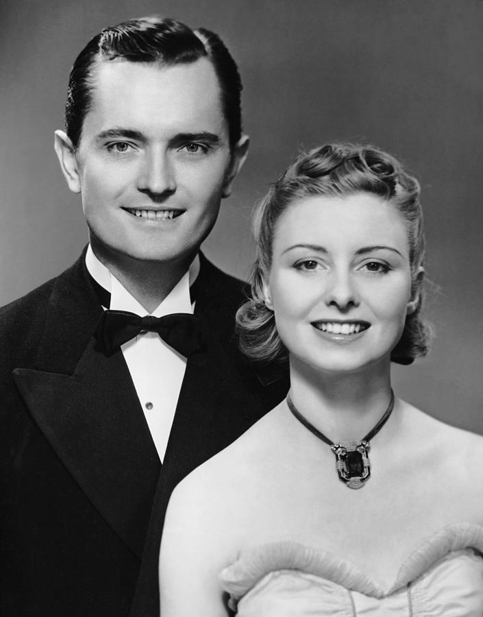 Black And White Photograph - Portrait Of Couple In Formal Wear by George Marks