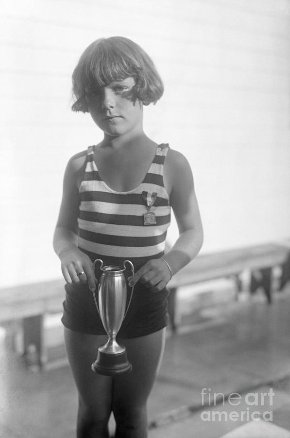 Portrait Of Girl 4-5 Holding Trophy Photograph by Bettmann