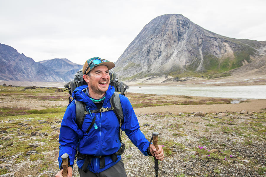 Mountain Photograph - Portrait Of Happy Mountaineer In Akshayuk Pass, Baffin Island, Canada by Cavan Images