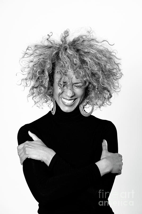 Portrait Of Laughing Woman With Afro Photograph by Westend61