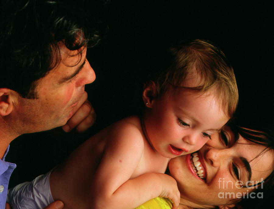 Portrait Of Proud Parents With Their Baby Photograph by Oscar Burriel/science Photo Library