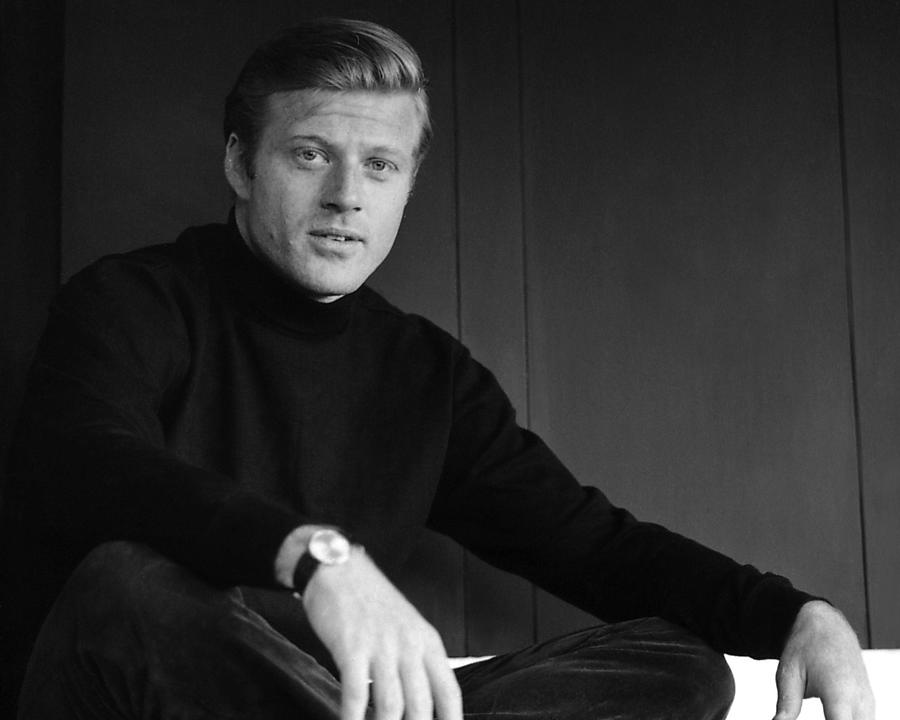 Robert Redford Photograph - Portrait Of Robert Redford Sitting With Legs Crossed by Globe Photos