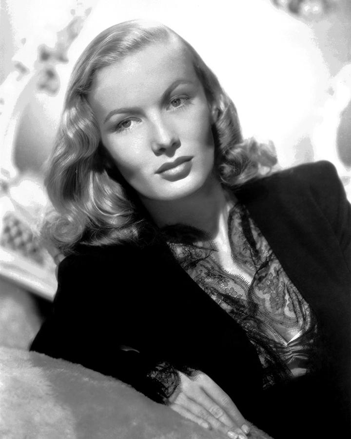 Portrait Of Veronica Lake Leaning On Bed Photograph by Globe Photos ...