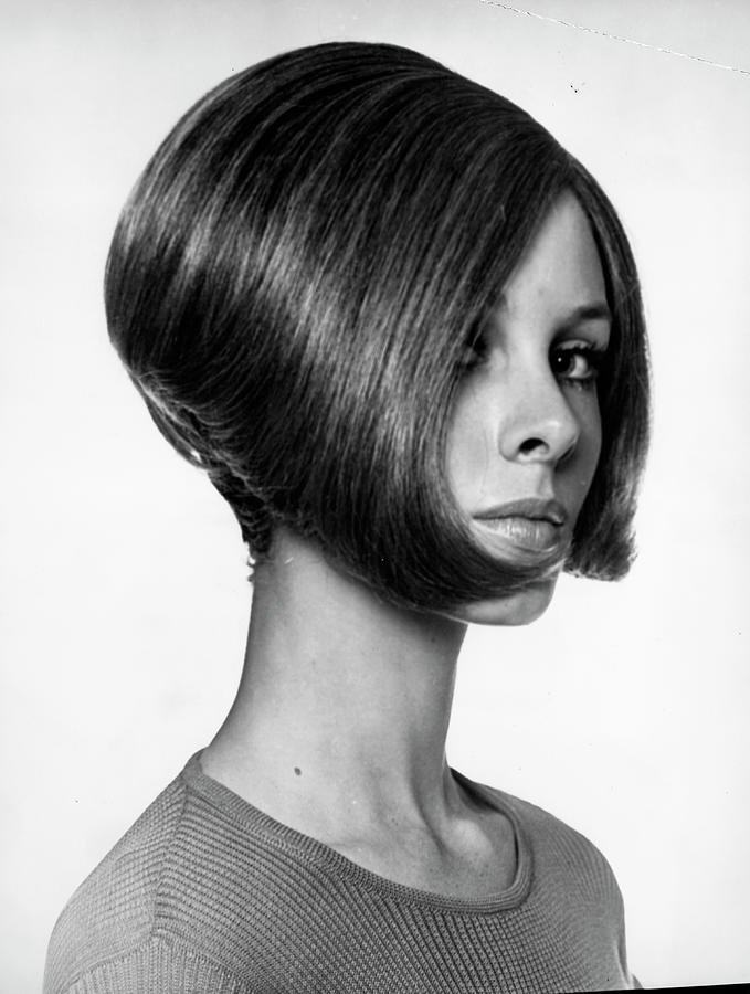 Portrait Of Woman With Modern Haircut Photograph by George Marks