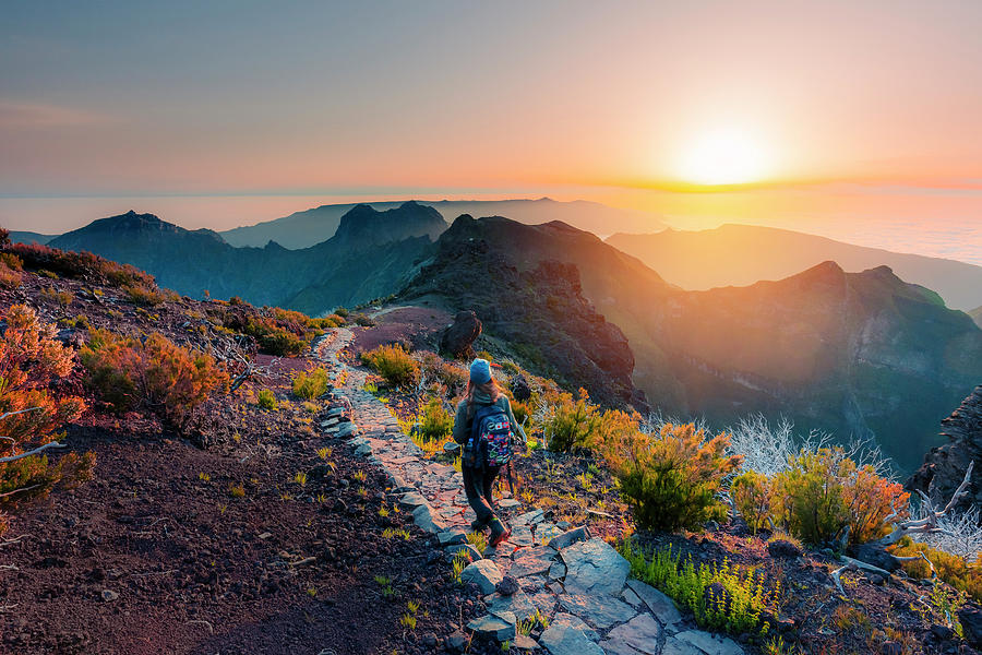 Portugal, Madeira, Atlantic Ocean, Madeira Island, Santana, A Woman Hiking On Top Of Pico Ruivo With Sun Setting On Picks & Atlantic Ocean Digital Art by Maurizio Rellini