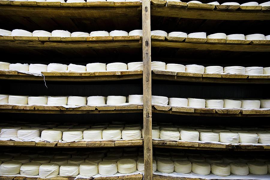 Portuguese Cheese Drying On Wooden Shelves Photograph by Nicolas Lemonnier