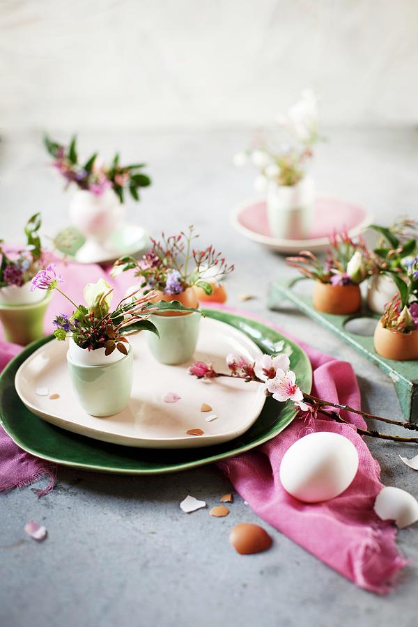 Posies Arranged In Empty Egg Shells On Table Photograph by Great Stock!