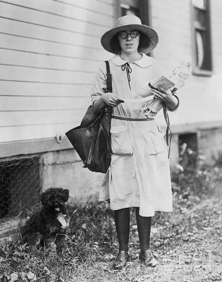 Postal Worker With Her Dog Photograph by Bettmann